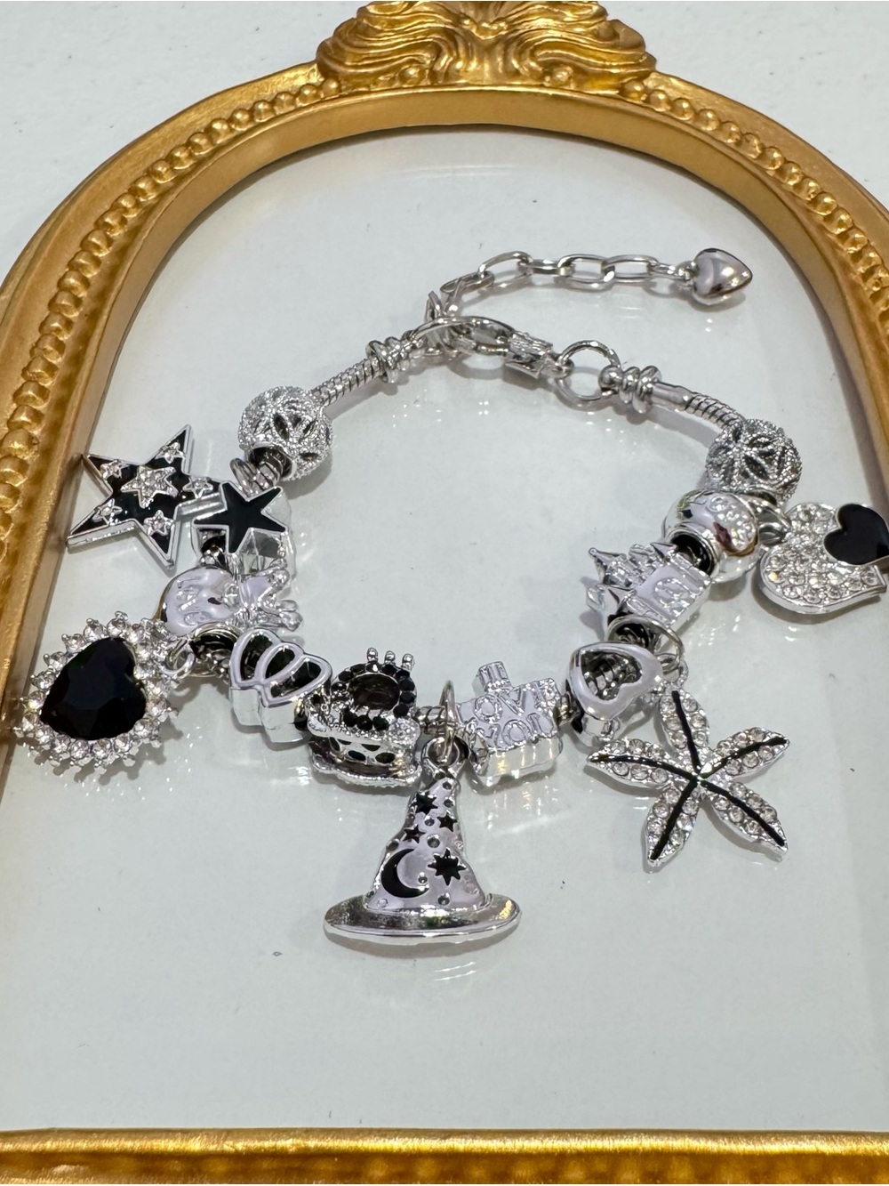 NewSilver and Black Charm Bracelet with Enamel Accents
